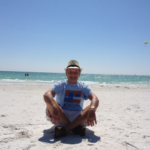 Lloyd_Dobson_Profile_Sitting_On_The_Beach