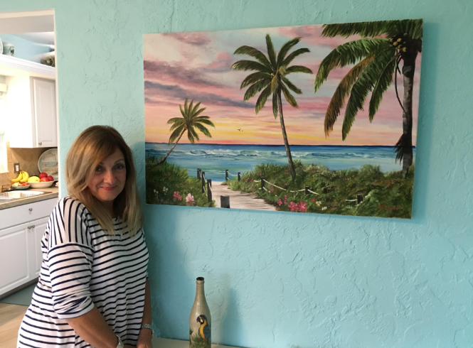A private collector Mary Phillippsen of an original oil painting by Lloyd Dobson Artist