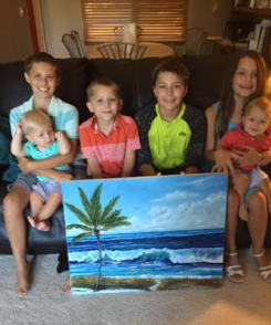 A commissioned oil painting by Lloyd Dobson Artist of the Michael Gillette family creating a Siesta Key Florida memory