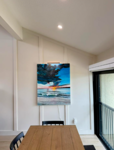 Oil painting hanging in their home titled "Anothe Beautiful Siesta Key Sunset" by Lloyd Dobson Artist